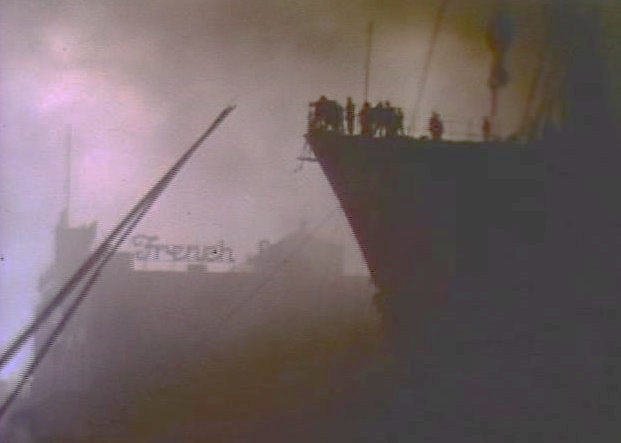 Firefighters tackle the fire on board SS Normandie 9 February 1942