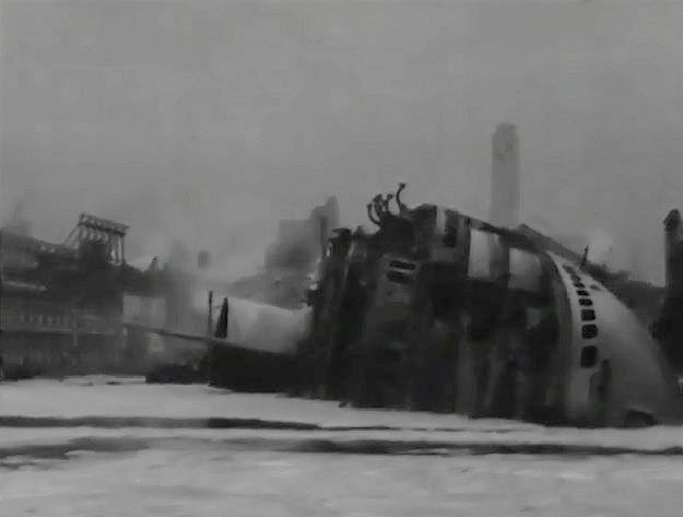 SS Normandie on her side in New York Harbour