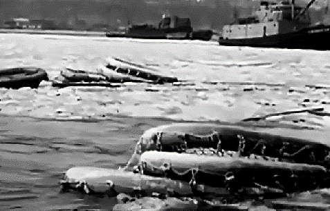 Debris from SS Normandie floats in New York Harbour