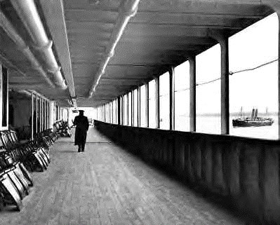 Captain Smith walking along Titanic Promendade deck
