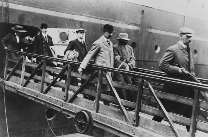 Dr Crippen being escorted after his arrest on 31 July 1910